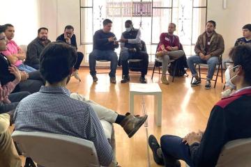 Group of persons discussing