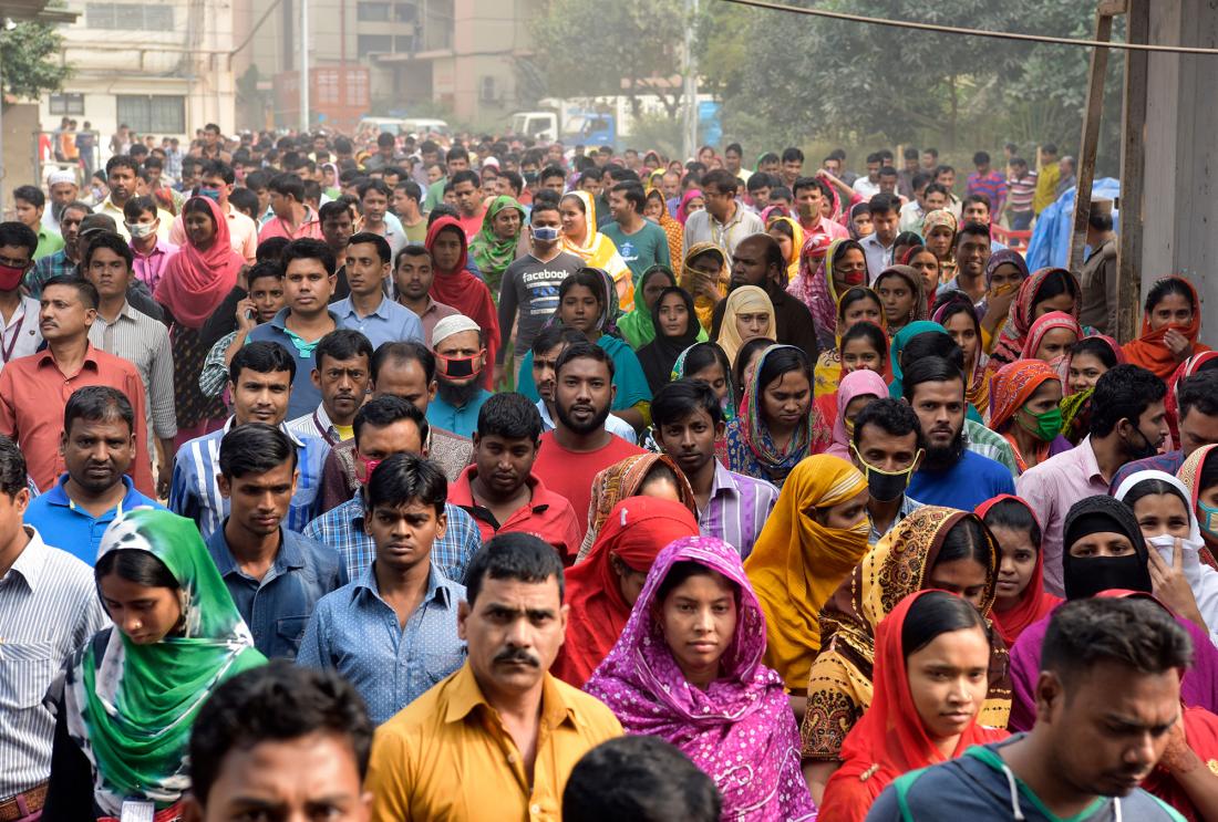 Workers return home after a day of work