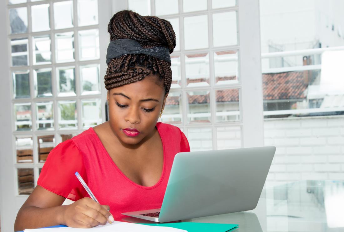 Woman working on her laptop.