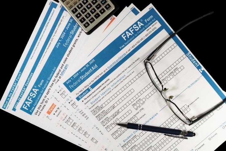 Stack of FAFSA forms in the United States