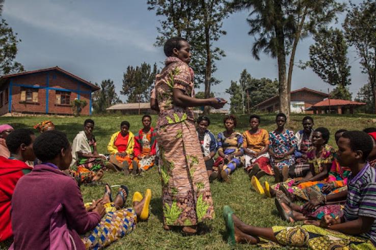 Women sitting in a circle during a meeting