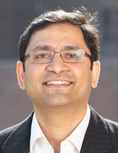 headshot of Tarun Jain wearing a white shirt