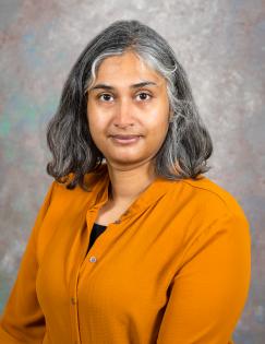 A headshot of a woman