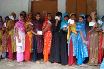 A group of girls with their ration cards in one of the study villages.