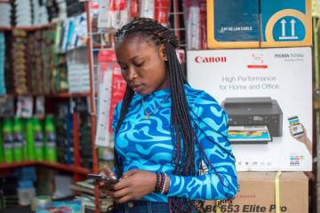 Woman on cell phone in Nigeria.