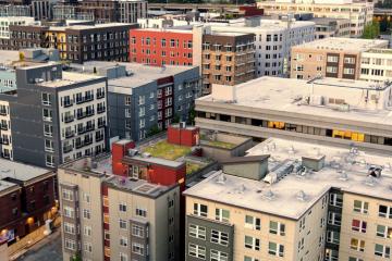 A cityscape crowded with apartment buildings.